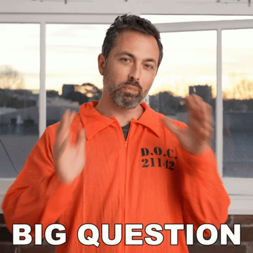 A Man In An Orange Jumpsuit With The Number 21142 On It GIF