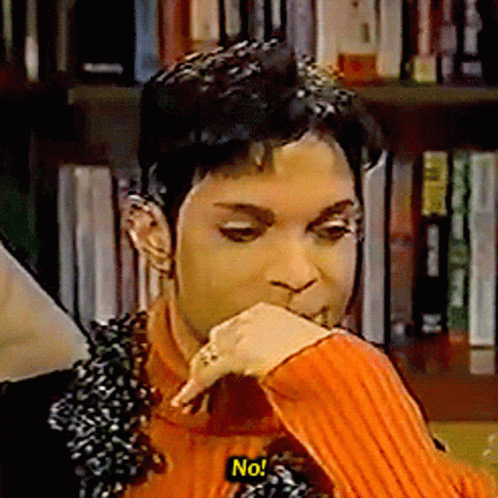 A Man In An Orange Sweater Says No In A Yellow Sticker GIF