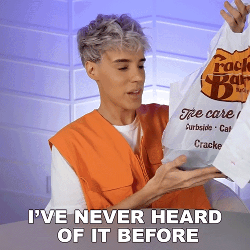 A Man In An Orange Vest Is Holding A Bag That Says Cracker Bar GIF