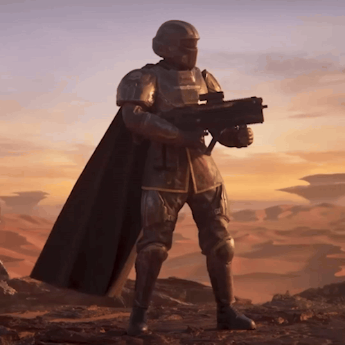 A Man In Armor Is Holding A Gun And Wearing A Black Cape GIF