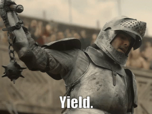 A Man In Armor Is Holding A Sword With The Word Yield Written Below Him GIF
