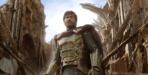 A Man In Armor Is Standing In A Ruined Building GIF