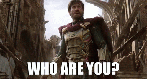 A Man In Armor Is Standing In A Ruined City With The Words Who Are You Behind Him GIF