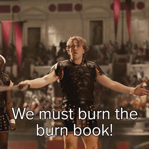 A Man In Armor Is Standing In Front Of A Crowd And Says We Must Burn The Burn Book GIF