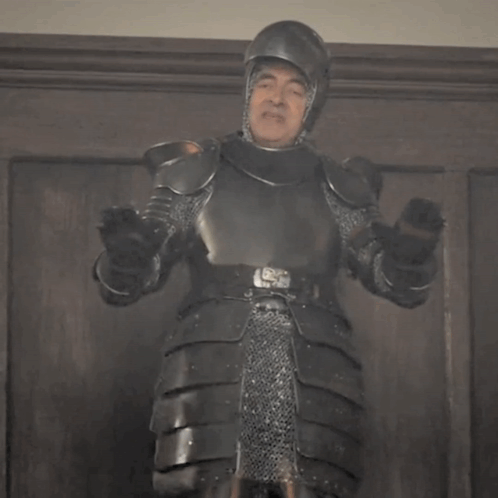 A Man In Armor With A Belt That Says Ls On It GIF