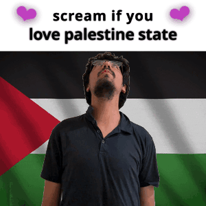 A Man In Front Of A Flag With The Words " Scream If You Love Palestine State " On It GIF