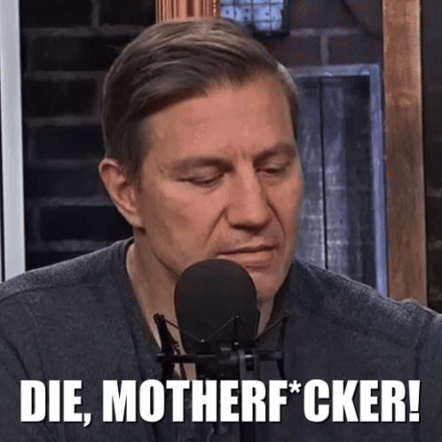 A Man In Front Of A Microphone With The Words Die Motherf * Cker GIF