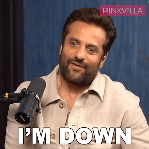 A Man In Front Of A Microphone With The Words I 'M Down On His Face GIF