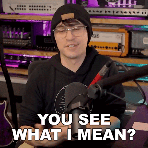 A Man In Front Of A Microphone With The Words " You See What I Mean " GIF