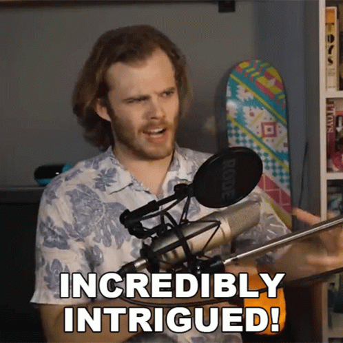 A Man In Front Of A Rode Microphone Is Saying " Incredibly Intrigued " GIF