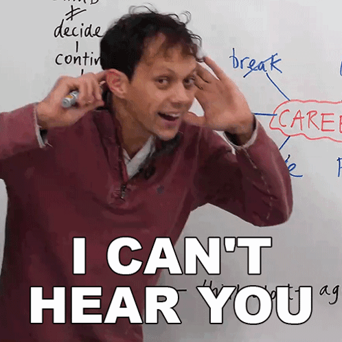 A Man In Front Of A White Board With The Words I Can 'T Hear You Written On It GIF