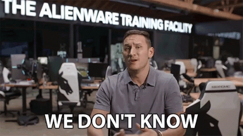 A Man In Front Of An Alienware Training Facility Says We Don 'T Know GIF