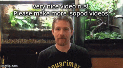 A Man In Front Of An Aquarium With The Words " Very Nice Video Rus Please Make More Isopod Videos " Below Him GIF