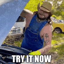 A Man In Overalls And A Cowboy Hat Is Working On A Car With The Words Try It Now Written On The Bottom GIF