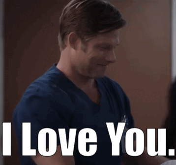a man in scrubs says " i love you "