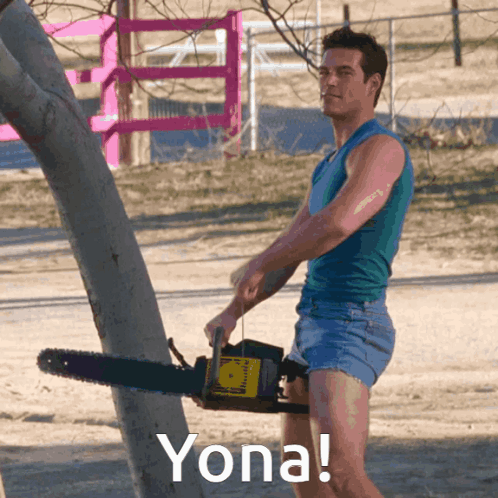 A Man In Shorts Is Holding A Chainsaw And Says Yona On The Bottom Right GIF