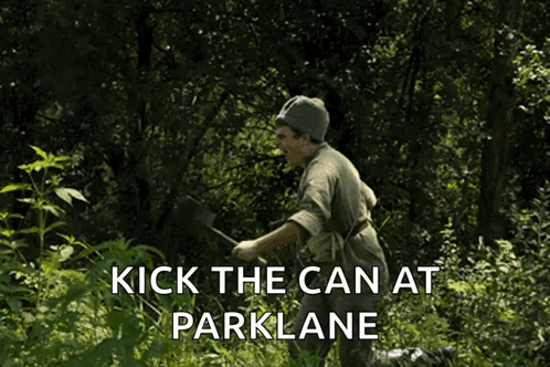 A Man In The Woods With The Words Kick The Can At Parklane On The Bottom GIF