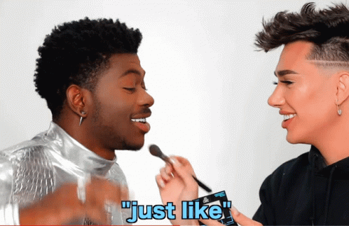 A Man Is Applying Makeup To Another Man 'S Face And The Caption Says " Just Like " GIF