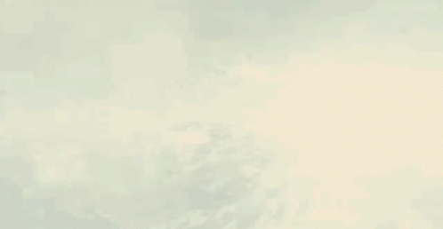 A Man Is Being Struck By A Lightning Bolt In A Dark Room . GIF