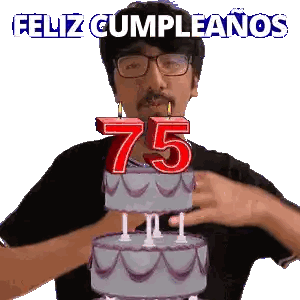 a man is blowing out candles on a birthday cake that says 75