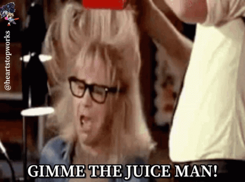 A Man Is Brushing A Woman 'S Hair And The Caption Says Gimme The Juice Man GIF