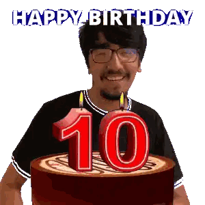 a man is celebrating his 10th birthday with a cake and a candle