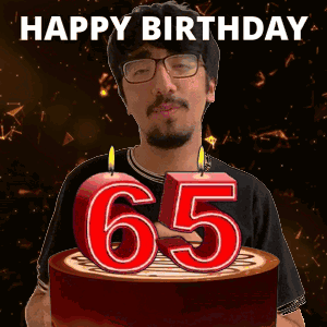 A Man Is Celebrating His 65Th Birthday By Blowing Out Candles GIF