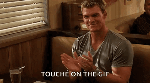 A Man Is Clapping His Hands In A Diner And The Words Touche On The Gif Are Visible GIF