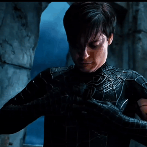 A Man Is Covered In Venom And Screaming With His Mouth Wide Open GIF