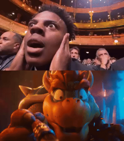 A Man Is Covering His Ears In Front Of A Crowd And A Picture Of A Cartoon Character GIF