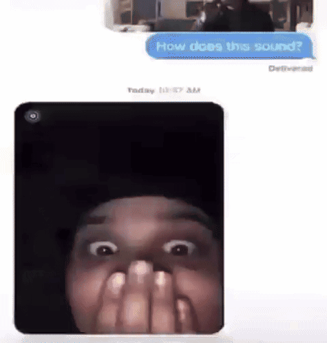 A Man Is Covering His Mouth With His Hands While A Text Message Says How Does The Sound GIF