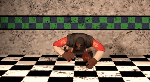 A Man Is Crawling On A Checkered Floor In Front Of A Wall GIF