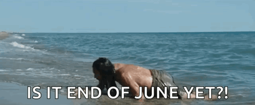 a man is crawling out of the ocean with the words " is it end of june yet "