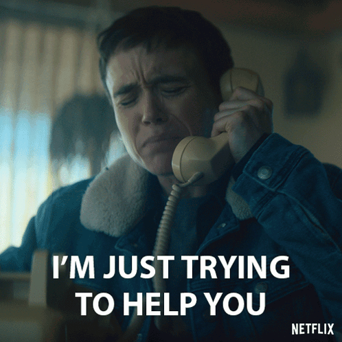 A Man Is Crying While Talking On A Telephone With The Words I 'M Just Trying To Help You Below Him GIF