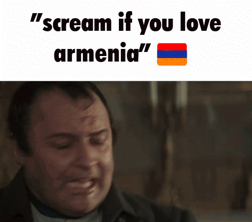 A Man Is Crying With The Words " Scream If You Love Armenia " Written Above Him GIF