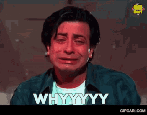 A Man Is Crying With The Words " Whyyyy " Written On The Screen GIF