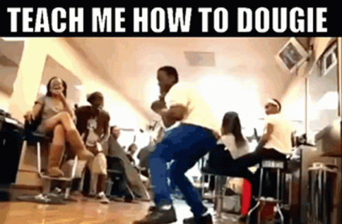 A Man Is Dancing In A Barber Shop With A Group Of People Sitting In Chairs . GIF
