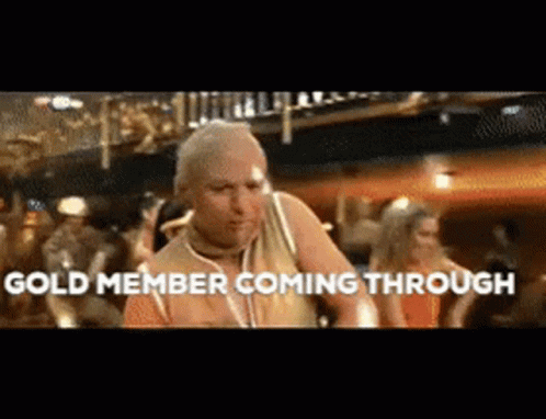 A Man Is Dancing In A Club With The Words Gold Member Coming Through Written On The Bottom GIF