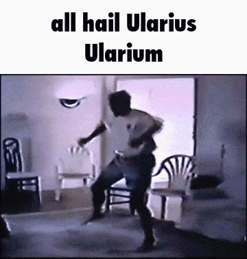 A Man Is Dancing In A Living Room With The Words All Hail Ularius Ularium On The Bottom GIF
