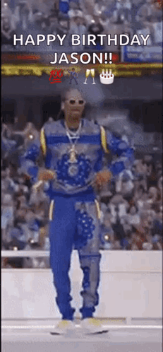 A Man Is Dancing In Front Of A Crowd With The Words `` Happy Birthday Jason '' Written On It . GIF
