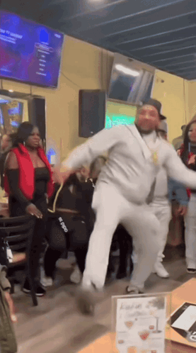 Man Dancing In Front Of Group GIF