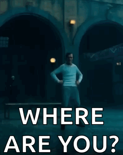 A Man Is Dancing In Front Of A Sign That Says " Where Are You " GIF