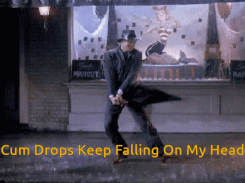 A Man Is Dancing In The Rain With The Words Cum Drops Keep Falling On My Head GIF