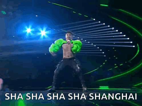 A Man Is Dancing On A Stage With The Words Sha Sha Sha Sha Shanghai GIF