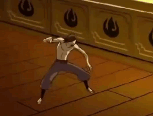 A Man Is Dancing On A Wooden Floor In Front Of A Wall With Fire Symbols . GIF