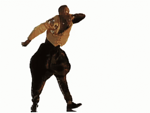 A Man Is Dancing With His Arms Outstretched GIF