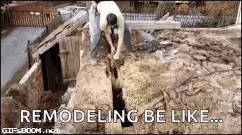 A Man Is Digging A Hole In The Ground With A Shovel In A Dirt Field . GIF