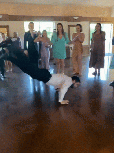 Man Doing Handstand On Dance Floor GIF
