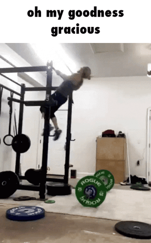 A Man Is Doing A Pull Up In A Gym With The Words Oh My Goodness Gracious On The Bottom GIF