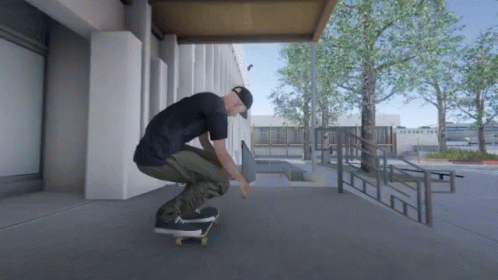 A Man Is Doing A Trick On His Skateboard GIF